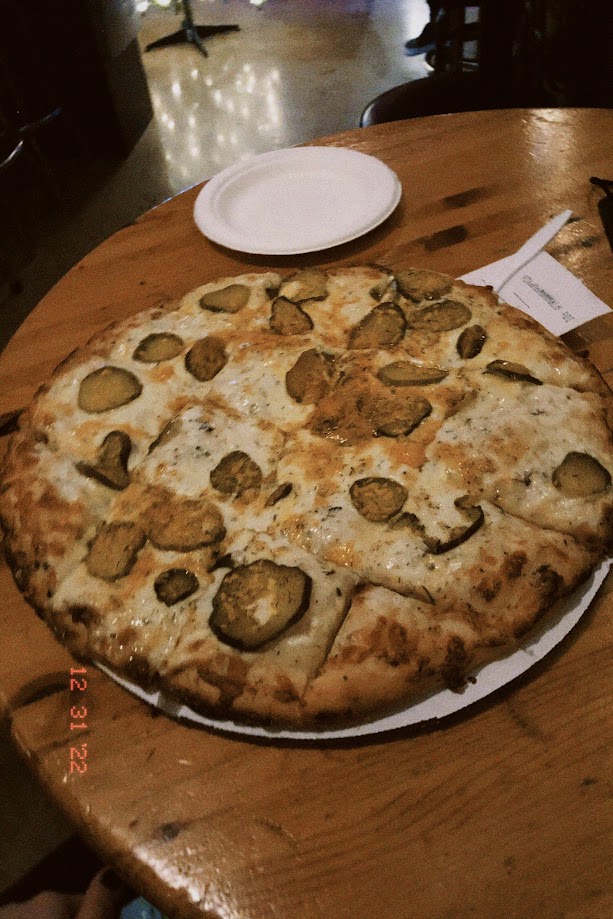 december 31, 2022: a pizza with pickles on it-- it was DELICIOUS, fight me about it!