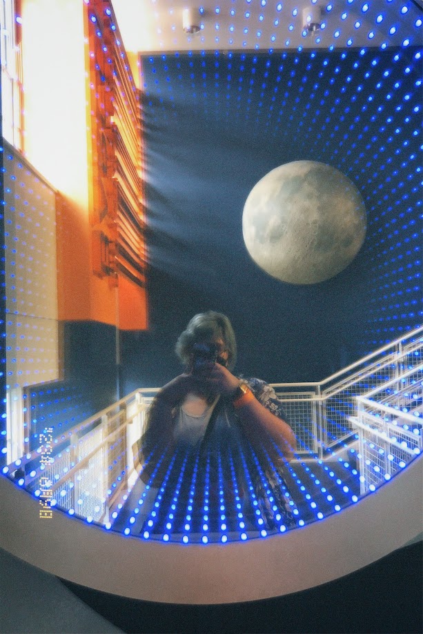 june 9, 2023: jude takes a selfie with the moon at COSI.